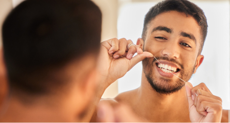 Man using dental floss