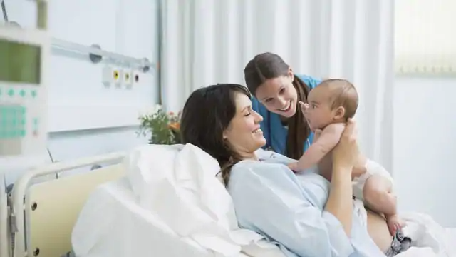 Woman in hospital with her baby