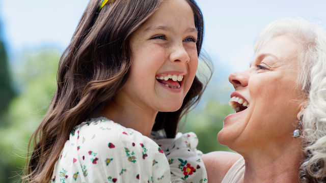 Girl laughing with her grandma